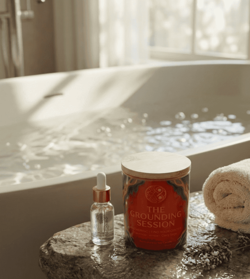 Aromatherapy soy candle on bathroom counter with dropper bottle, in a cozy setting with natural light, wooden lid, 10 oz size